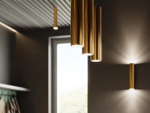 Miniatura 4 - Zlaté závěsné tubusy LED v luksusowym interiéru s černým sufitem